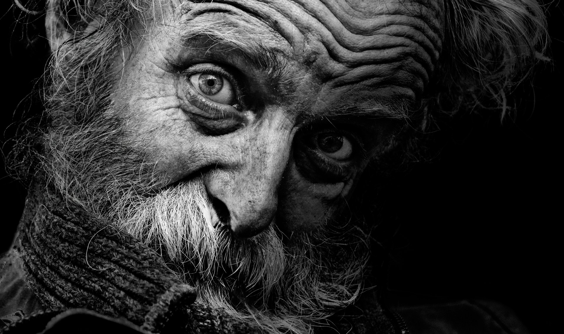 An elderly man with rough face